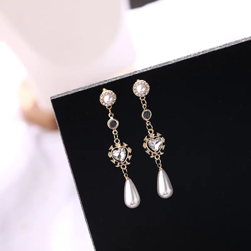 Elegant Silver Pearl Heart Earrings